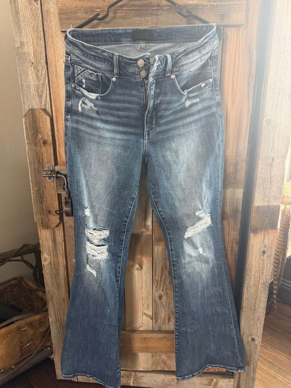 Buckle Black Women's Distressed flare jeans.